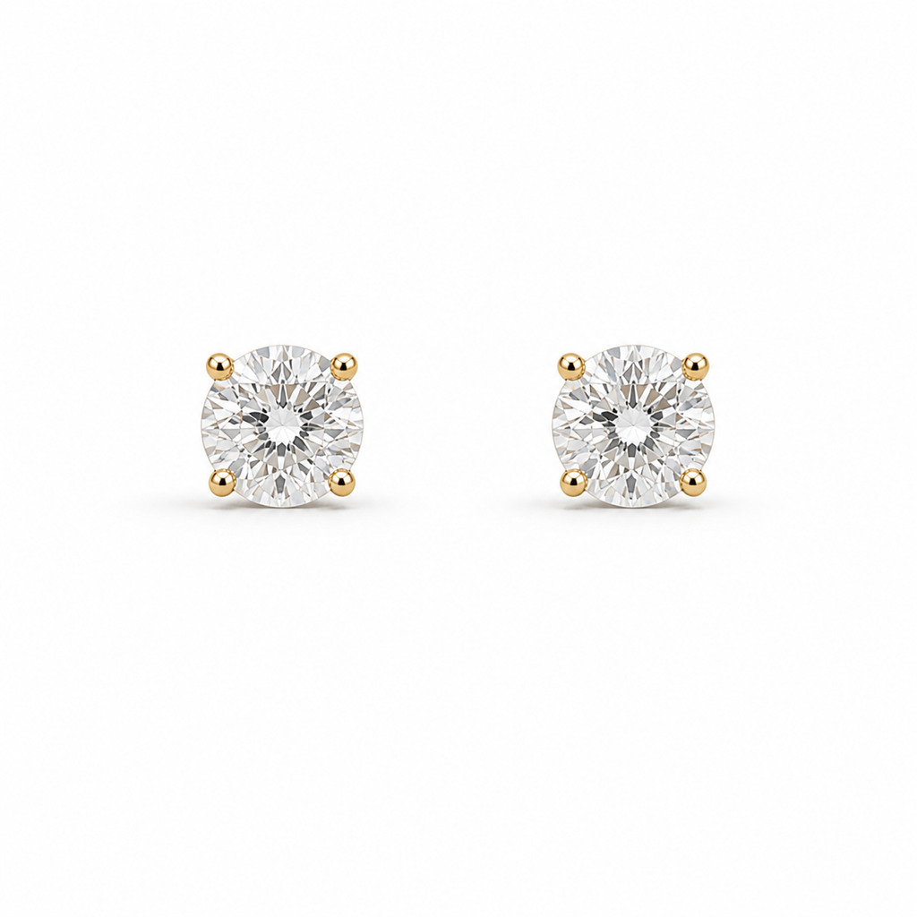 Puces d’oreilles en or jaune 18 carats