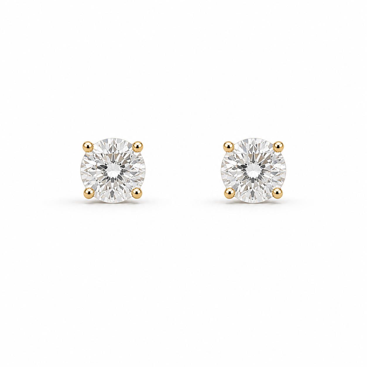 Puces d’oreilles en or jaune 18 carats