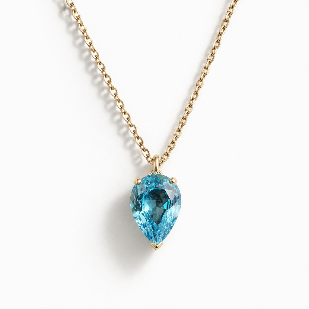 Collier en or jaune 18 carats  Zircon bleu taille poire